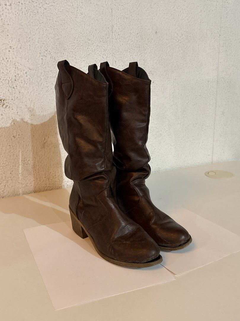 WOMENS BROWN LEATHER COWBOY BOOTS (Category: Boots) located in Valenzuela. Submitted by banappleangel (Listing ID 1454585204, Image 1). Description: when worn in last slides — SIZE 37 — Very comfy! — Medyo nganga na yung sole ng tip ng boots pero hindi pinapasukan ng tubig (CAN BE GLUED!) — Very stylish! My favorite pair ever — With box MEASUREMENT sole 26.5cm heels 6cm calf 19.5cm height 37cm.