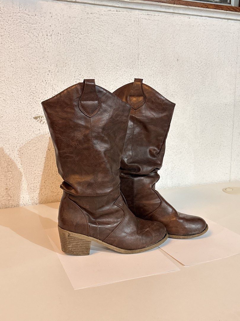 WOMENS BROWN LEATHER COWBOY BOOTS (Category: Boots) located in Valenzuela. Submitted by banappleangel (Listing ID 1454585204, Image 2). Description: when worn in last slides — SIZE 37 — Very comfy! — Medyo nganga na yung sole ng tip ng boots pero hindi pinapasukan ng tubig (CAN BE GLUED!) — Very stylish! My favorite pair ever — With box MEASUREMENT sole 26.5cm heels 6cm calf 19.5cm height 37cm.