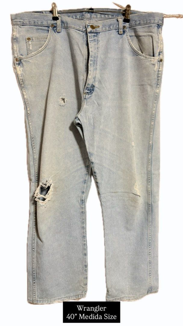 Wrangler Light Wash Distressed Denim Jeans Size 40 (Category: Jeans) located in Antipolo. Submitted by heynarraaa (Listing ID 1454568936, Image 1). Description: - Light wash Wrangler jeans - Size 40 - Distressed rips on front pockets and legs - Classic denim style - Ready for a new home.
