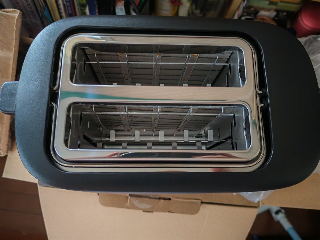 Xiaomi Toaster (Category: Ovens & Toasters) located in Quezon City. Submitted by jeckmarj (Listing ID 1454609583, Image 3). Description: - Xiaomi Toaster in sleek Black color - Wide slots accommodate various bread types - Simple dial for easy browning level adjustment - Effortless to use, ideal for quick morning toast.
