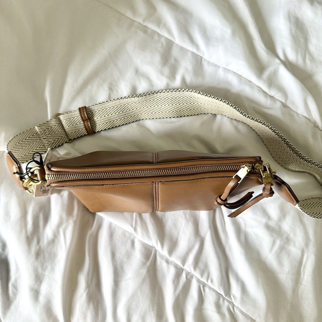 Zara Brown Leather Crossbody Bag (Category: Cross-body Bags) located in Bulacan. Submitted by amandddda (Listing ID 1454680509, Image 3). Description: • brand new and authentic!! comes with the original tag • includes detachable zigzag strap and separate thin leather strap • rfs: not being used.