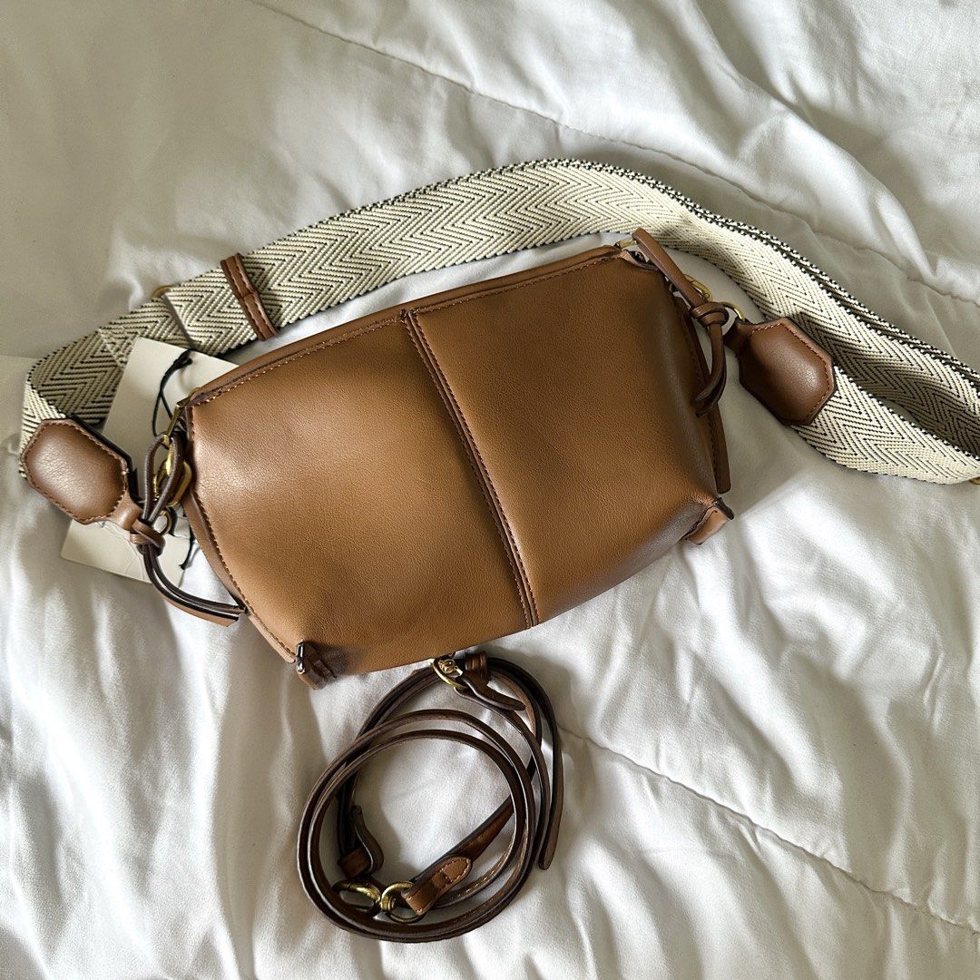 Zara Brown Leather Crossbody Bag (Category: Cross-body Bags) located in Bulacan. Submitted by amandddda (Listing ID 1454680509, Image 2). Description: • brand new and authentic!! comes with the original tag • includes detachable zigzag strap and separate thin leather strap • rfs: not being used.
