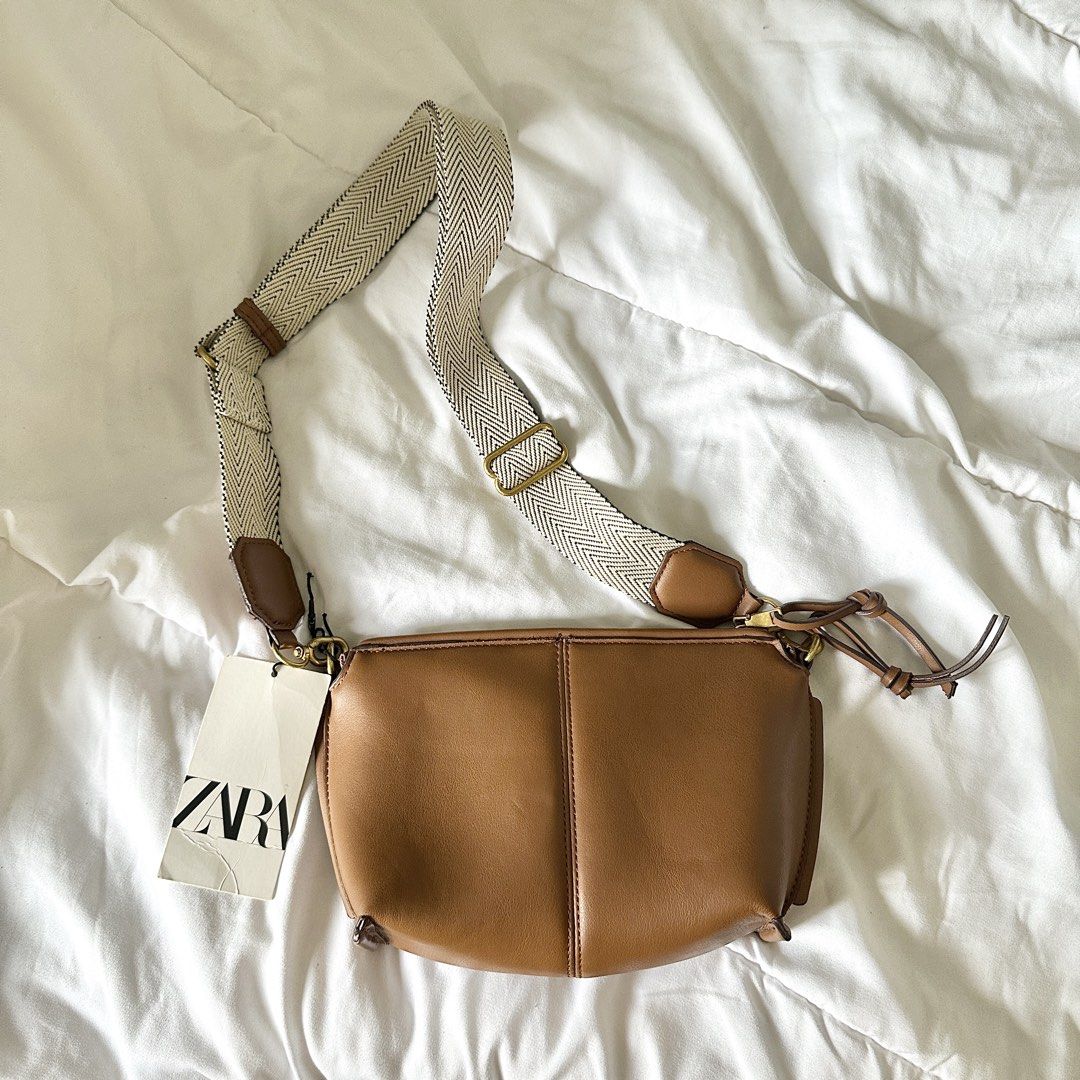 Zara Brown Leather Crossbody Bag (Category: Cross-body Bags) located in Bulacan. Submitted by amandddda (Listing ID 1454680509, Image 1). Description: • brand new and authentic!! comes with the original tag • includes detachable zigzag strap and separate thin leather strap • rfs: not being used.