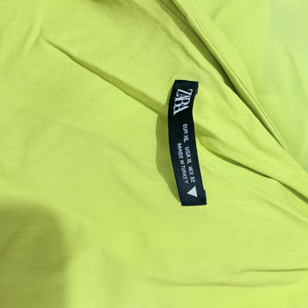 Zara Lime Asymmetrical Knot Dress (Category: Dresses) located in Manila. Submitted by theopal (Listing ID 1454613846, Image 3). Description: * Color: Lime green May vary due to lighting * Style: One-shoulder mini dress * Detail: Shoulder tie/knot * Fit: Fitted, body-hugging silhouette * Waist: Ruched with side knot detail and side zipper * Design: Draped and gathered skirt * Occasion: Party, date night, events, and special occasions.