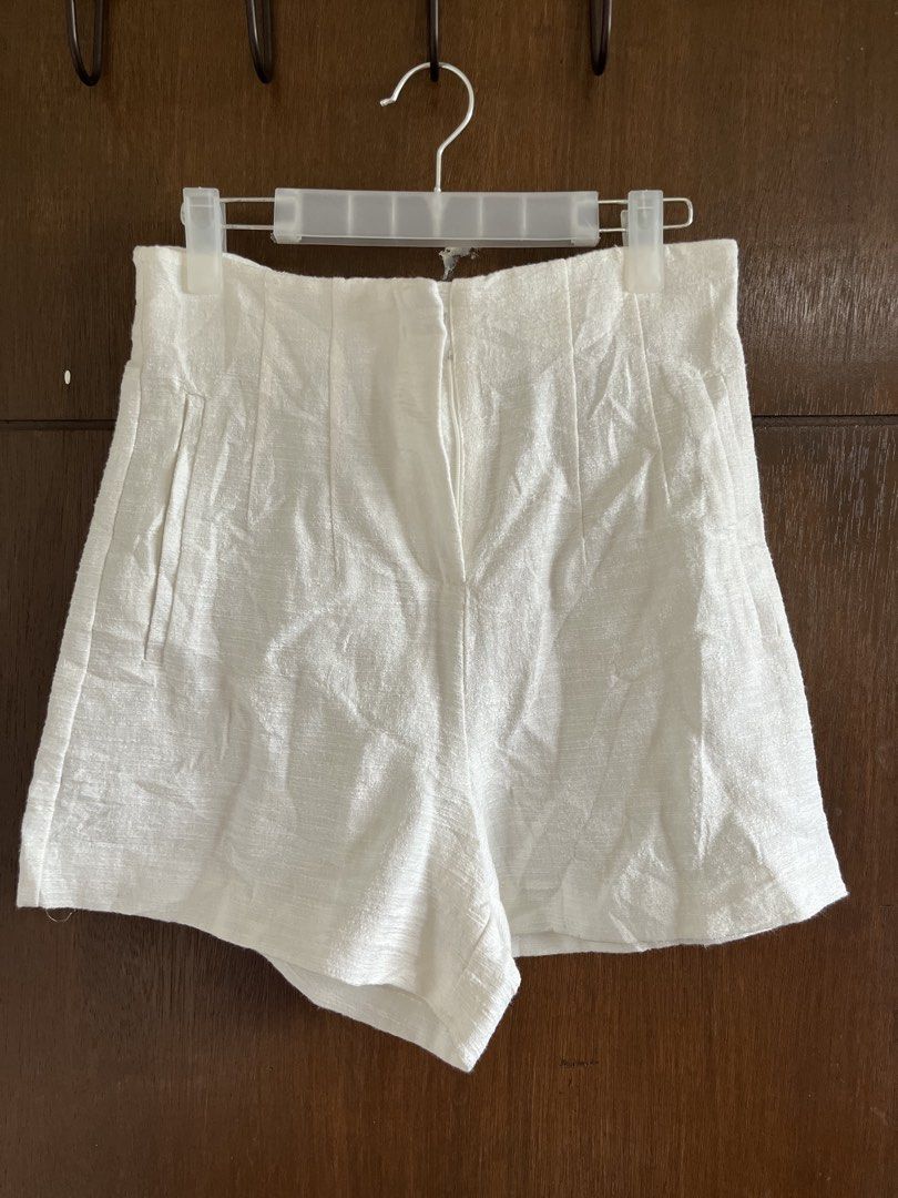 Zara Textured High waisted White Shorts (Category: Shorts) located in Muntinlupa City. Submitted by lovedbysabel (Listing ID 1451449122, Image 2). Description: Zara Textured White Shorts A staple piece for your wardrobe! Bought at Zara Greenbelt. Used only a few times and still in perfect condition. Super comfy and versatile, making it easy to pair with any look. Size S (26-27 waistline, 15" length) Making space in my closet, so I’m letting go of