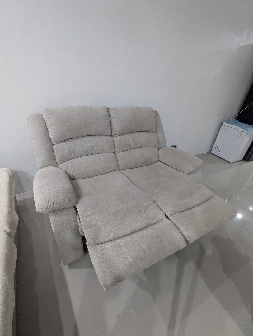 2-Seater Recliner Sofa (Category: Sofas) located in Manila. Submitted by hernalcri15190 (Listing ID 1458912465, Image 3). Description: - Comfortable 2-seater sofa - In light beige fabric - Both sides recline - Easy-to-operate manual recline mechanism - Pick up only (SJDM, Bulacan) Rfs: need to let go; doesn't fit in the space anymore .