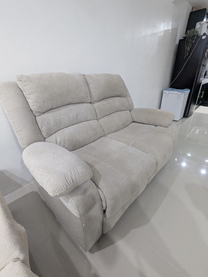 2-Seater Recliner Sofa (Category: Sofas) located in Manila. Submitted by hernalcri15190 (Listing ID 1458912465, Image 2). Description: - Comfortable 2-seater sofa - In light beige fabric - Both sides recline - Easy-to-operate manual recline mechanism - Pick up only (SJDM, Bulacan) Rfs: need to let go; doesn't fit in the space anymore .