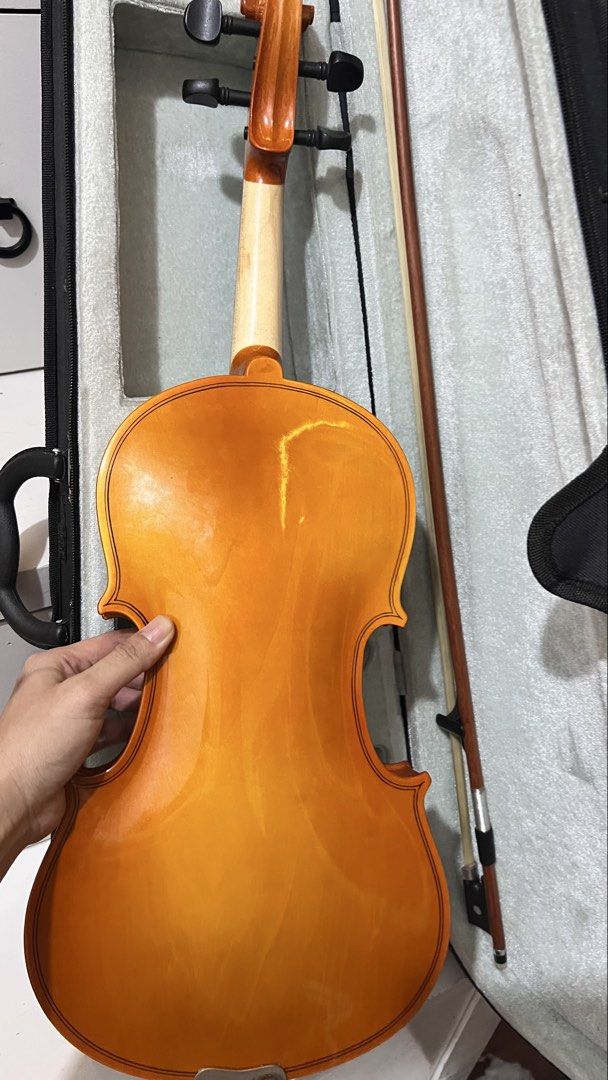 4/4 Violin Bought from RJ at SM (Category: Musical Instruments) located in General Trias. Submitted by scentsndmore (Listing ID 1458993517, Image 3). Description: 📌 For Sale: 4/4 Violin Age: 3 months old Purchased at RJ Music Instruments, SM Dasma Reason for selling: Upgraded to a professional violin Condition: Used but still in excellent condition 🏷️ Price: ₱3,000 (original price ₱4,000, receipt included).