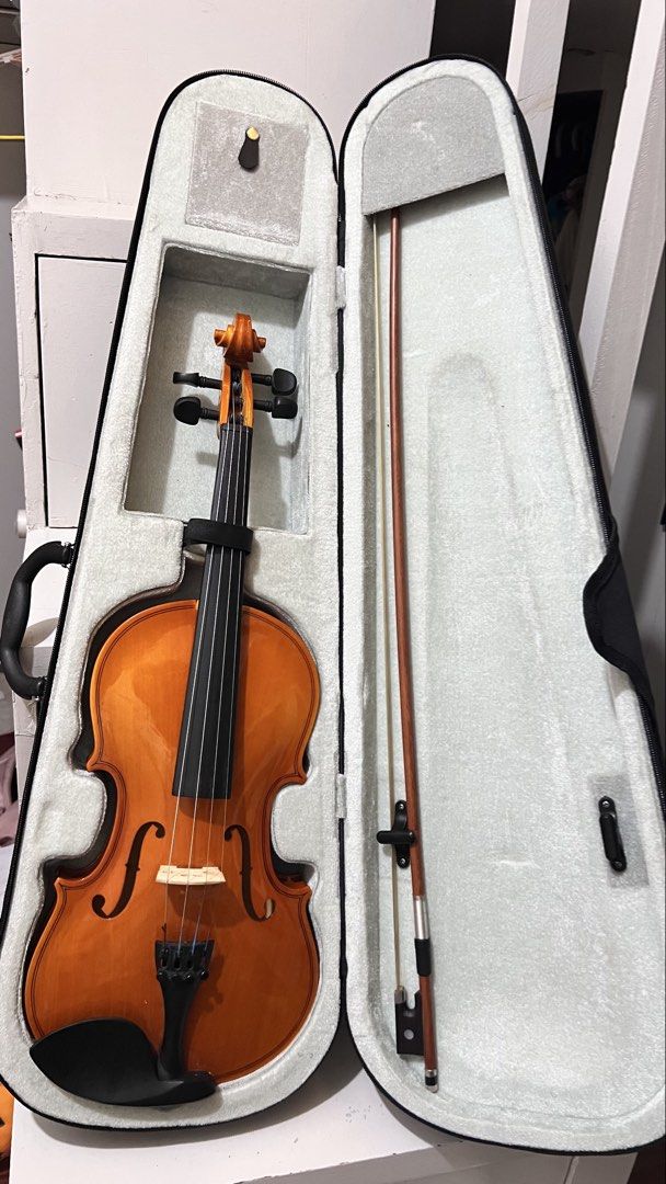 4/4 Violin Bought from RJ at SM (Category: Musical Instruments) located in General Trias. Submitted by scentsndmore (Listing ID 1458993517, Image 1). Description: 📌 For Sale: 4/4 Violin Age: 3 months old Purchased at RJ Music Instruments, SM Dasma Reason for selling: Upgraded to a professional violin Condition: Used but still in excellent condition 🏷️ Price: ₱3,000 (original price ₱4,000, receipt included).