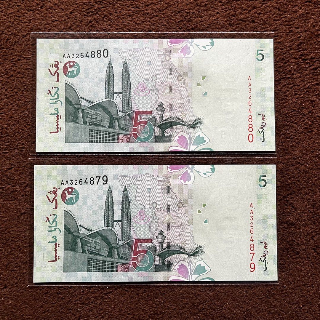 5 ringgit AA prefix unc (Category: Currency) located in Kamunting. Submitted by zulkifli1879651 (Listing ID 1458945728, Image 2). Description: AA prefix unc running number 2 pcs rm70.