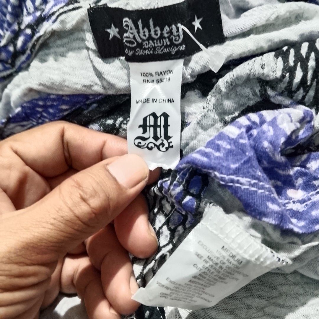 Abbey Dawn by Avril Lavigne (Category: Others Tops) located in Davao. Submitted by outdatedfinds (Listing ID 1459014106, Image 1). Description: Abbey Dawn by Avril Lavigne Tops size medium no Issue 599 Freeshipping Davao City Location hmu f interested.