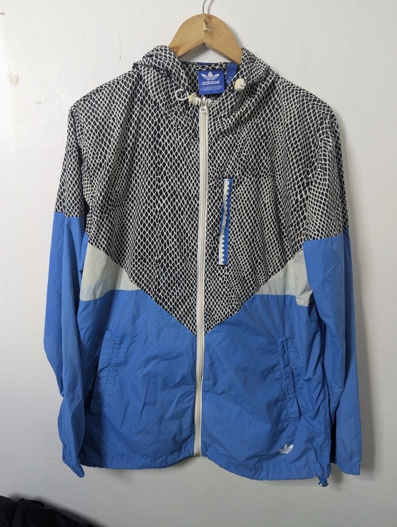 Adidas Light Windbreaker for Men - Medium (Category: Coats, Jackets and Outerwear) located in Quezon City. Submitted by activefitforless (Listing ID 1459084168, Image 2). Description: All items are preloved / thrifted and may show normal signs of previous use. Any noticeable flaws will be disclosed whenever possible. Please check the actual item photos and measurements before purchasing. AI-generated model images are used for styling and fit refe