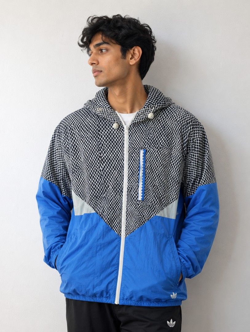 Adidas Light Windbreaker for Men - Medium (Category: Coats, Jackets and Outerwear) located in Quezon City. Submitted by activefitforless (Listing ID 1459084168, Image 1). Description: All items are preloved / thrifted and may show normal signs of previous use. Any noticeable flaws will be disclosed whenever possible. Please check the actual item photos and measurements before purchasing. AI-generated model images are used for styling and fit refe