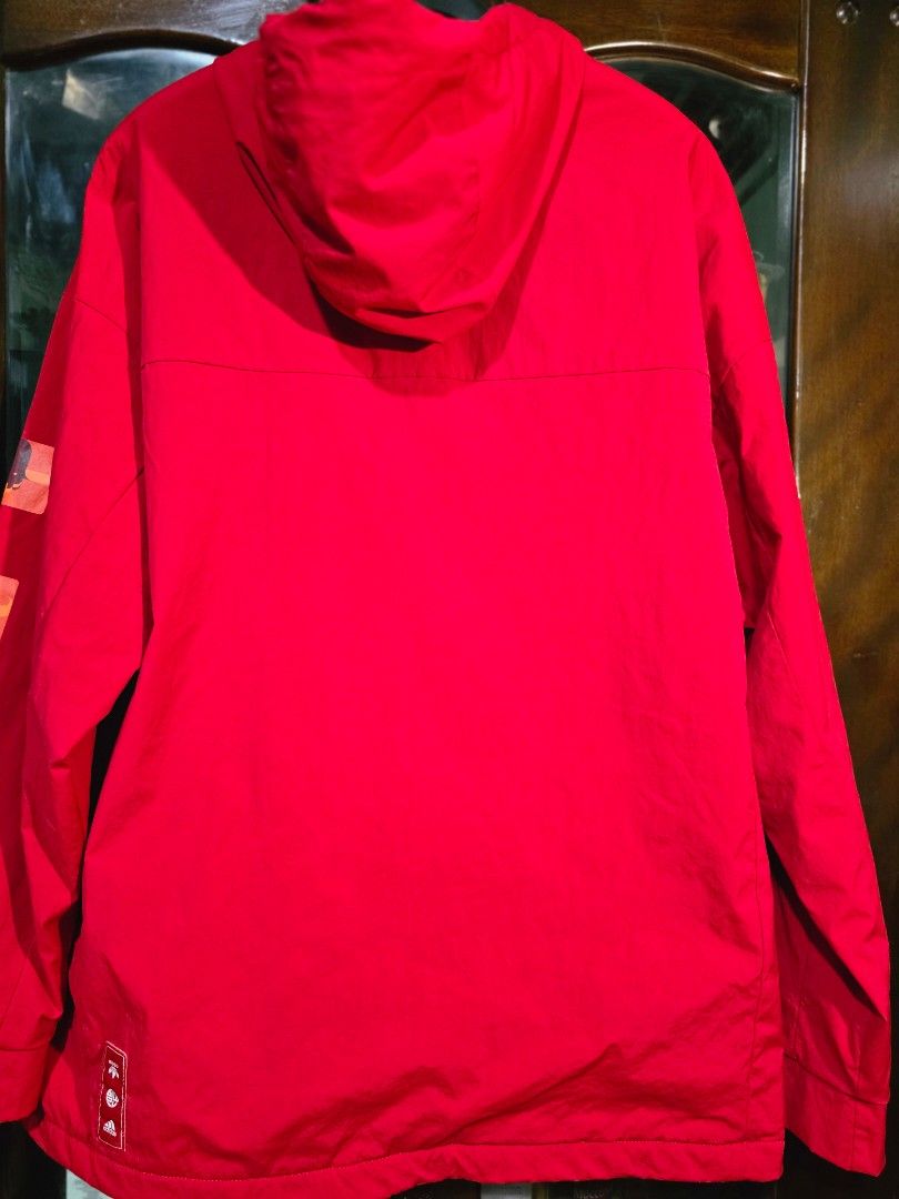 Adidas Red Jacket with Chinese New Year Graphics (Category: Coats, Jackets and Outerwear) located in Baguio. Submitted by genesisomega (Listing ID 1458966358, Image 3). Description: - Vibrant bright red Adidas jacket - Unique Chinese New Year graphic design on pockets - Classic Adidas logo on the chest - Adjustable drawstrings on hood and hem - Full zipper closure - Dimes 27 x 32 - Ideal for everyday casual wear ✨ PLEASE READ BEFORE BUYING! ✨ 👕 