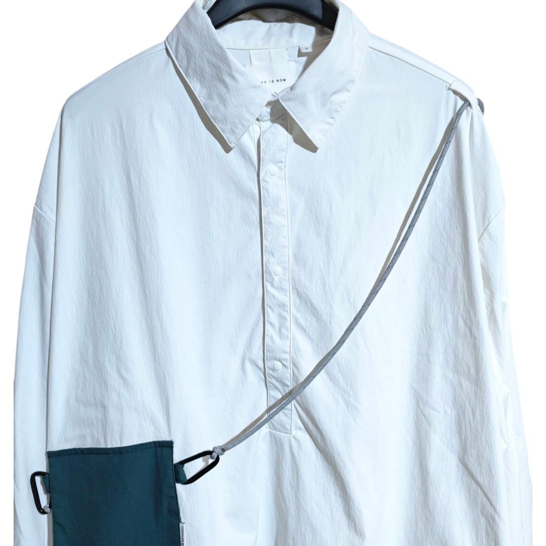 AD-LIB (ST478) Sacoche Shirt (Category: Coats, Jackets and Outerwear) located in Quezon City. Submitted by oldturnedtogold (Listing ID 1459032919, Image 2). Description: AD-LIB (ST478) Sacoche Shirt Size Small Off-White Shoulder Width - 22.5" Body length - 27.5" Chest width - 25" Sleeve Length - 21.5" Details: - stretch nylon fabric - comfy fit - splash proof - detachable shoulder strap - functional integrated sacoche - Shipping fee to be shoulde