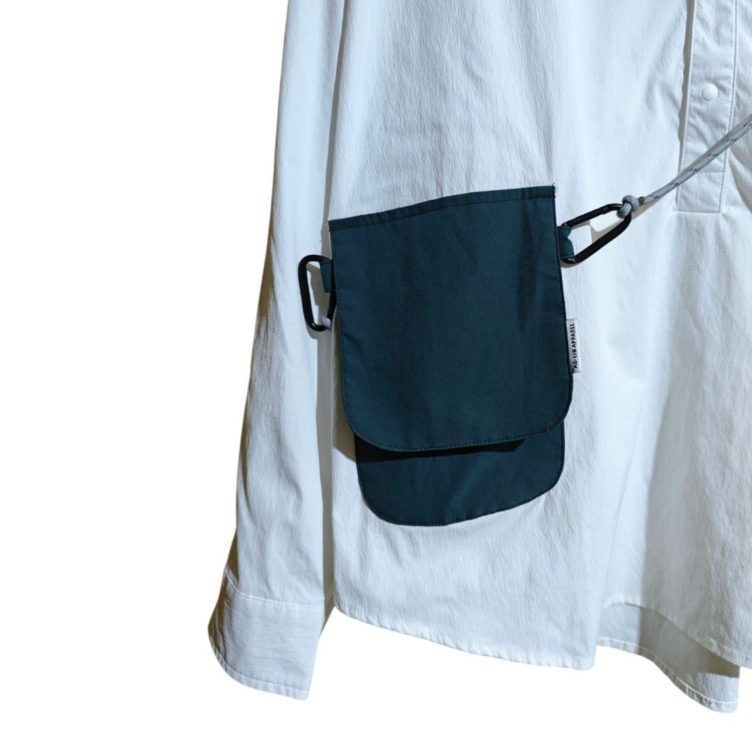AD-LIB (ST478) Sacoche Shirt (Category: Coats, Jackets and Outerwear) located in Quezon City. Submitted by oldturnedtogold (Listing ID 1459032919, Image 3). Description: AD-LIB (ST478) Sacoche Shirt Size Small Off-White Shoulder Width - 22.5" Body length - 27.5" Chest width - 25" Sleeve Length - 21.5" Details: - stretch nylon fabric - comfy fit - splash proof - detachable shoulder strap - functional integrated sacoche - Shipping fee to be shoulde