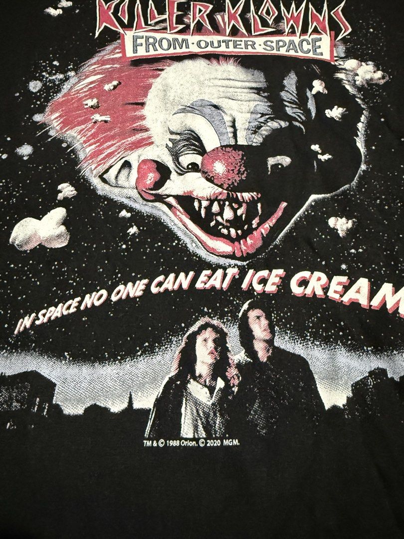 American Classics Killer Klowns From Outer Space T-Shirt Large (Category: Tshirts & Polo Shirts ) located in Baguio. Submitted by shadaxcel (Listing ID 1459045257, Image 2). Description: - Black t-shirt featuring Killer Klowns From Outer Space graphic - Iconic clown design with the quote 'In Space No One Can Eat Ice Cream' - Officially licensed apparel from American Classics - Made from 100% comfortable cotton - Tagged as size Large - Ideal for f