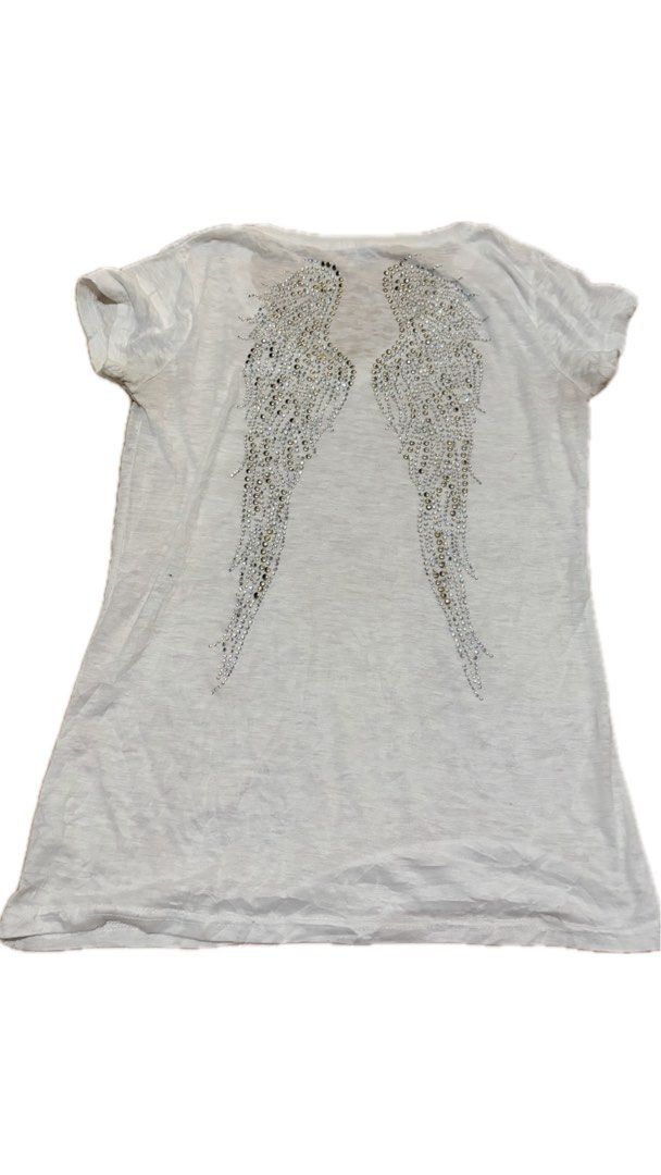 Angel wings with gemstones (Category: Shirts) located in Tarlac. Submitted by calive (Listing ID 1458926160, Image 1). Description: Its slightly see through so u need something white underneath it:).