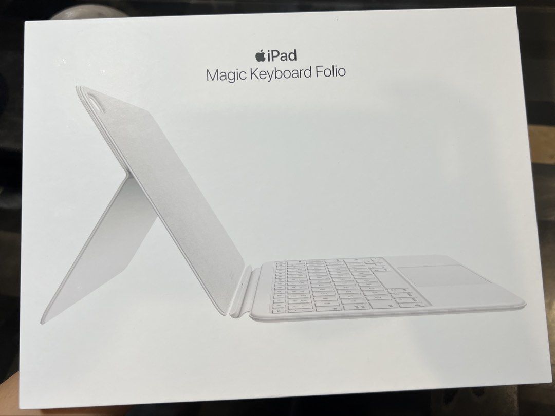 Apple iPad Magic Keyboard Folio / A16 (Category: Computer Keyboard) located in Muntinlupa City. Submitted by katakana02 (Listing ID 1459081002, Image 1). Description: - Genuine Apple Magic Keyboard Folio - Color: White/Grey - Compatible with 11-inch iPad Pro and iPad Air models / A16 - Integrated keyboard for comfortable typing - Built-in trackpad for seamless navigation - Enhances productivity and user experience - Includes original packaging.