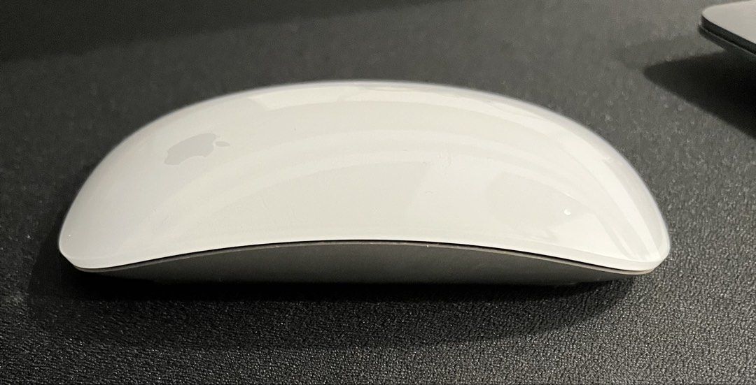 Apple magic mouse (Category: Mouse & Mousepads) located in Kulai. Submitted by ahl13579 (Listing ID 1459022158, Image 3). Description: Condition good Comes with box and cable.