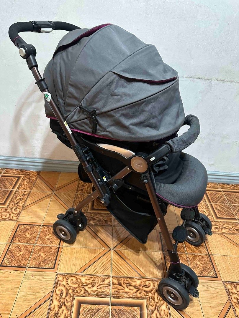 Aprica Stroller - Purple and Grey (Category: Strollers) located in Imus. Submitted by rwnmv88 (Listing ID 1458984064, Image 3). Description: - Used Combi stroller -Purchased Brand New - Includes canopy for sun protection - Padded seat for baby's comfort - Secure harness for safety - Sturdy wheels for smooth travel - Folds easily for convenient storage - Ideal for everyday outings.