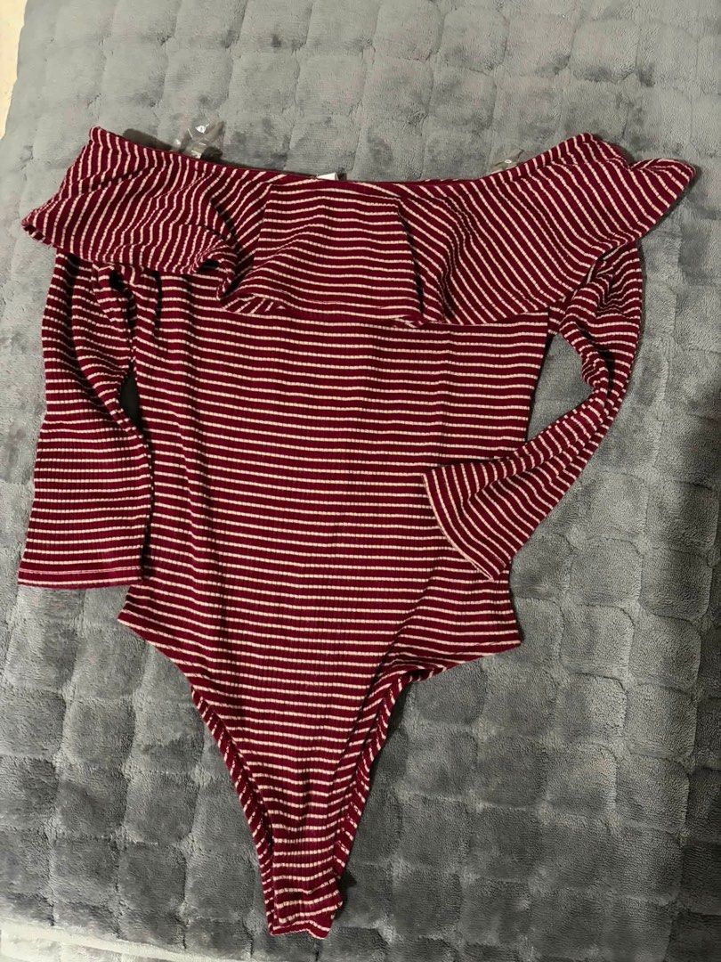 ARDENE off-shoulder bodysuit (Category: Others Tops) located in Bacoor. Submitted by gailscollections (Listing ID 1459018319, Image 3). Description: 🍷 FOR SALE — ₱350 ONLY! 🍷 ✨ ARDENE Off-Shoulder Bodysuit 🤎 Burgundy & cream stripe design 🎀 Cute off-shoulder + long sleeves 💃 Flattering fitted bodysuit style 📏 Size Small (S) 🧺 Preloved — good condition 💰 ₱350 only! Perfect for jeans, skirts, or shorts. Super cute for casual or going-out ou