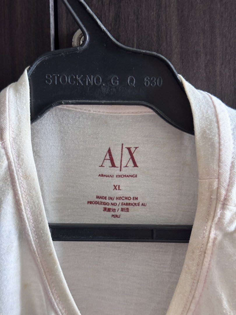 Armani Exchange Graphic T-Shirt (Category: Tshirts & Polo Shirts ) located in Manila. Submitted by enzomagbat44789 (Listing ID 1458989279, Image 2). Description: XL | 21x27 Preloved | Not Ukay 8/10 Condition Issue: yellow stains (washable) Shipping via JnT / LBC (COD).