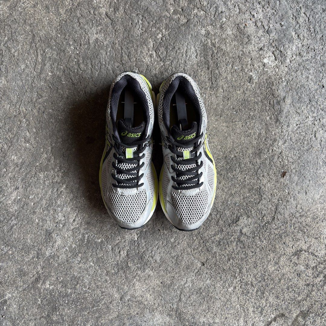 Asics GT-2000 3 Running - Silver/Lime Yellow (Category: Sneakers) located in Taguig. Submitted by _grailedph (Listing ID 1459081141, Image 2). Description: Asics GT-2000 3 Running - Silver/Lime Yellow Authentic Size: 7.5mens/25.5cm Signs of usage (Check pics) Wearable Pair only/As is Good Condition ₱ 1,000.