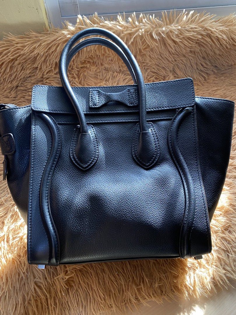 Authentic Céline Micro Luggage Tote bag (Category: Luxury Bags & Wallets) located in Manila. Submitted by sangalangmarvs (Listing ID 1459054974, Image 2). Description: Authentic Celine Micro Luggage Tote 📌 Color: Black 📌 Size: Micro 26x26 📌 Condition: Preloved / Good condition 📌 Bag only ✨ Classic and timeless Celine design ✨ Perfect for everyday use or collection ✨ Selling as-is, please check all photos carefully for the condition and detail