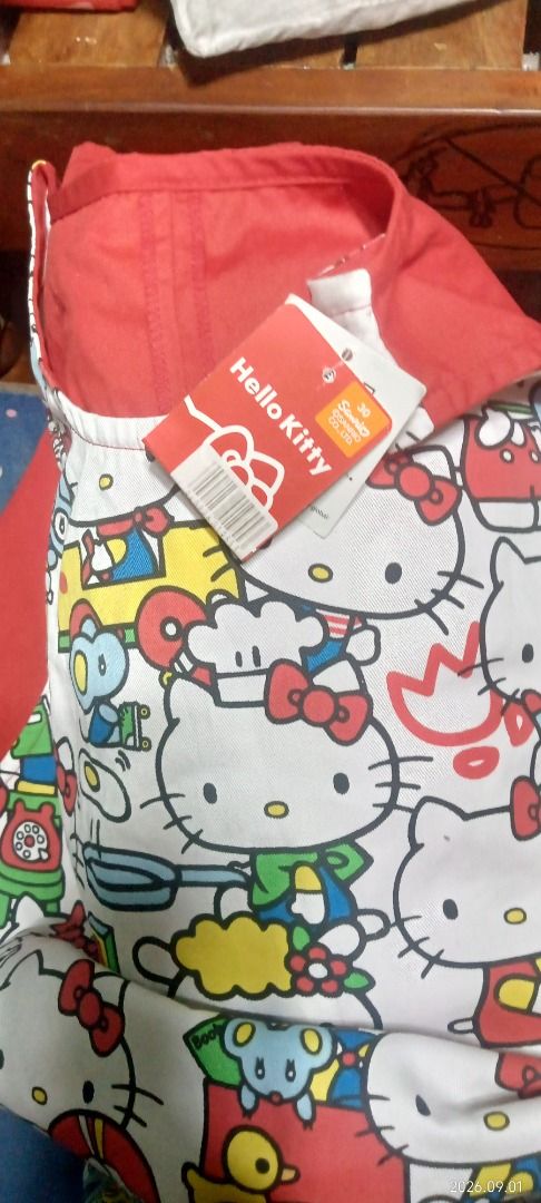 AUTHENTIC Hello Kitty Character Apron (Direct from Japan) (Category: Sleeveless) located in San Jose del Monte. Submitted by cams.ellie (Listing ID 1458994577, Image 2). Description: 🇯🇵Selling this beautiful, 100% genuine Sanrio licensed Hello Kitty apron! Brand new with original Japanese retail tags still attached. Perfect for Sanrio collectors, bakers, home cooks, or café owners who love the classic aesthetic.✨ PRODUCT DETAILS:• Condition: Br