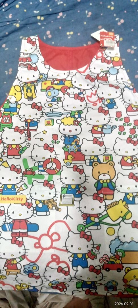 AUTHENTIC Hello Kitty Character Apron (Direct from Japan) (Category: Sleeveless) located in San Jose del Monte. Submitted by cams.ellie (Listing ID 1458994577, Image 3). Description: 🇯🇵Selling this beautiful, 100% genuine Sanrio licensed Hello Kitty apron! Brand new with original Japanese retail tags still attached. Perfect for Sanrio collectors, bakers, home cooks, or café owners who love the classic aesthetic.✨ PRODUCT DETAILS:• Condition: Br