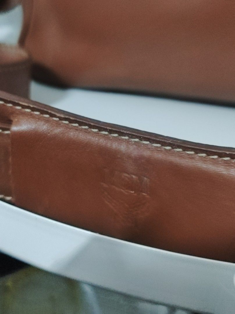 Authentic MCM Sling Bag (Category: Sling Bags) located in Santa Rosa. Submitted by sassycollection. (Listing ID 1459085070, Image 2). Description: Real genuine leather In good condition No issues.
