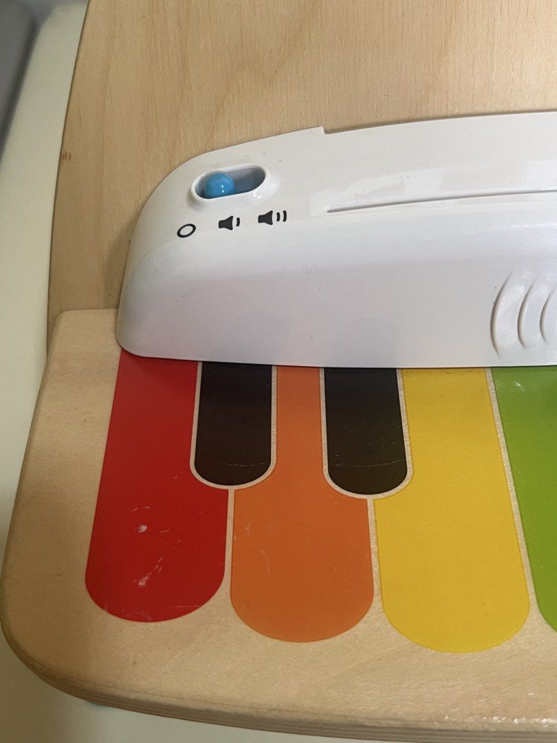 Baby Einstein and Hape Magic Touch Piano (Category: Infant Playtime) located in Angono. Submitted by elyenitty_ (Listing ID 1458925793, Image 2). Description: Key Features - Magic Touch Technology: The wooden keys respond to a light touch without needing traditional buttons or pressed keys. - Color-Coded Keys: Features bright, painted colors to help young children learn colors and match notes. - Sound Control: Includes power and volume buttons on