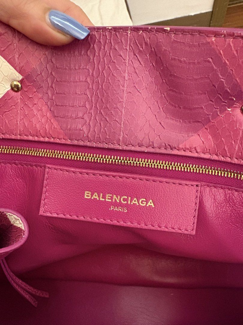 Balenciaga Pink White Python Leather Tote Bag (Category: Luxury Bags & Wallets) located in Pasig City. Submitted by authentic_shopaholic_manila (Listing ID 1458956375, Image 3). Description: - Authentic Balenciaga tote bag - Color: Pink and white python leather - Features: Top handles, detachable shoulder strap, gold hardware - Interior: Zip pocket, Balenciaga logo - Origin: Made in Italy - Serial Number: 432596.9060.C.1669 - Includes: Dust bag.