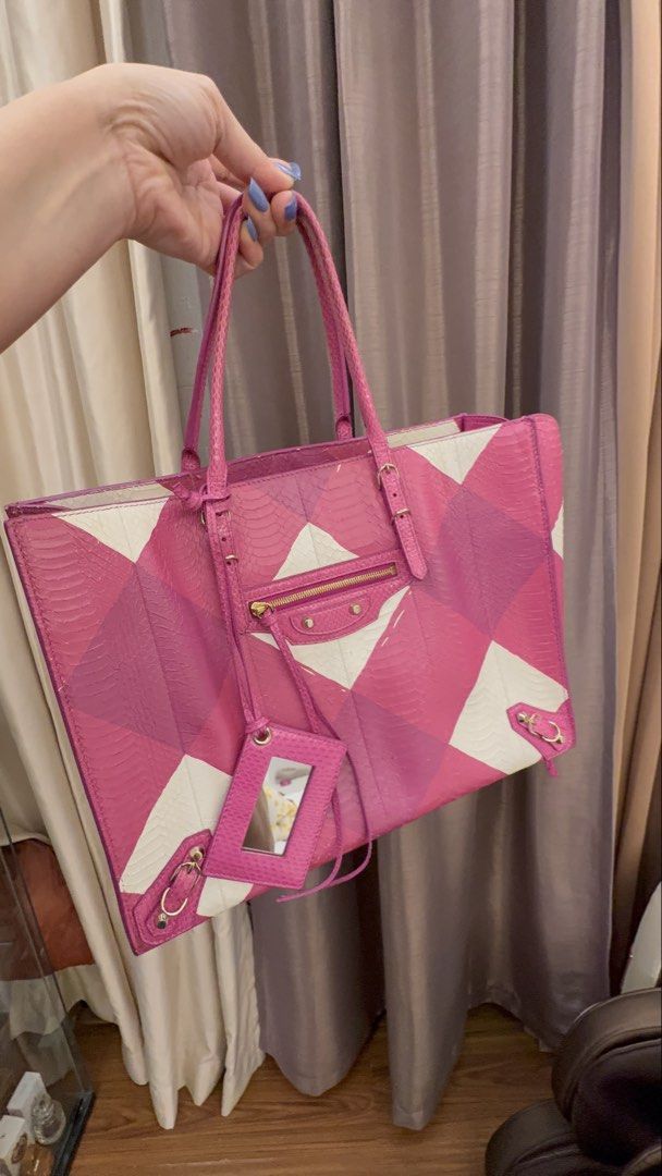 Balenciaga Pink White Python Leather Tote Bag (Category: Luxury Bags & Wallets) located in Pasig City. Submitted by authentic_shopaholic_manila (Listing ID 1458956375, Image 2). Description: - Authentic Balenciaga tote bag - Color: Pink and white python leather - Features: Top handles, detachable shoulder strap, gold hardware - Interior: Zip pocket, Balenciaga logo - Origin: Made in Italy - Serial Number: 432596.9060.C.1669 - Includes: Dust bag.