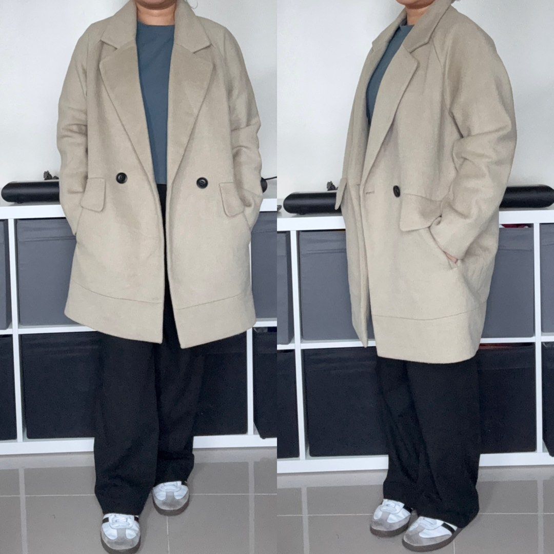 Beige Wool Blend Double Breasted Coat Size Large with full inner lining (Category: Coats, Jackets and Outerwear) located in Quezon City. Submitted by springdreamph (Listing ID 1459025602, Image 1). Description: - Beige (green undertone) double-breasted coat - Brand: TOPFEELING - Material: Wool blend polyester fabric - Full inner lining - Features: Two front pockets, button closure - Thick fabric - Ideal for: 10 degrees and below - Styling: Versat