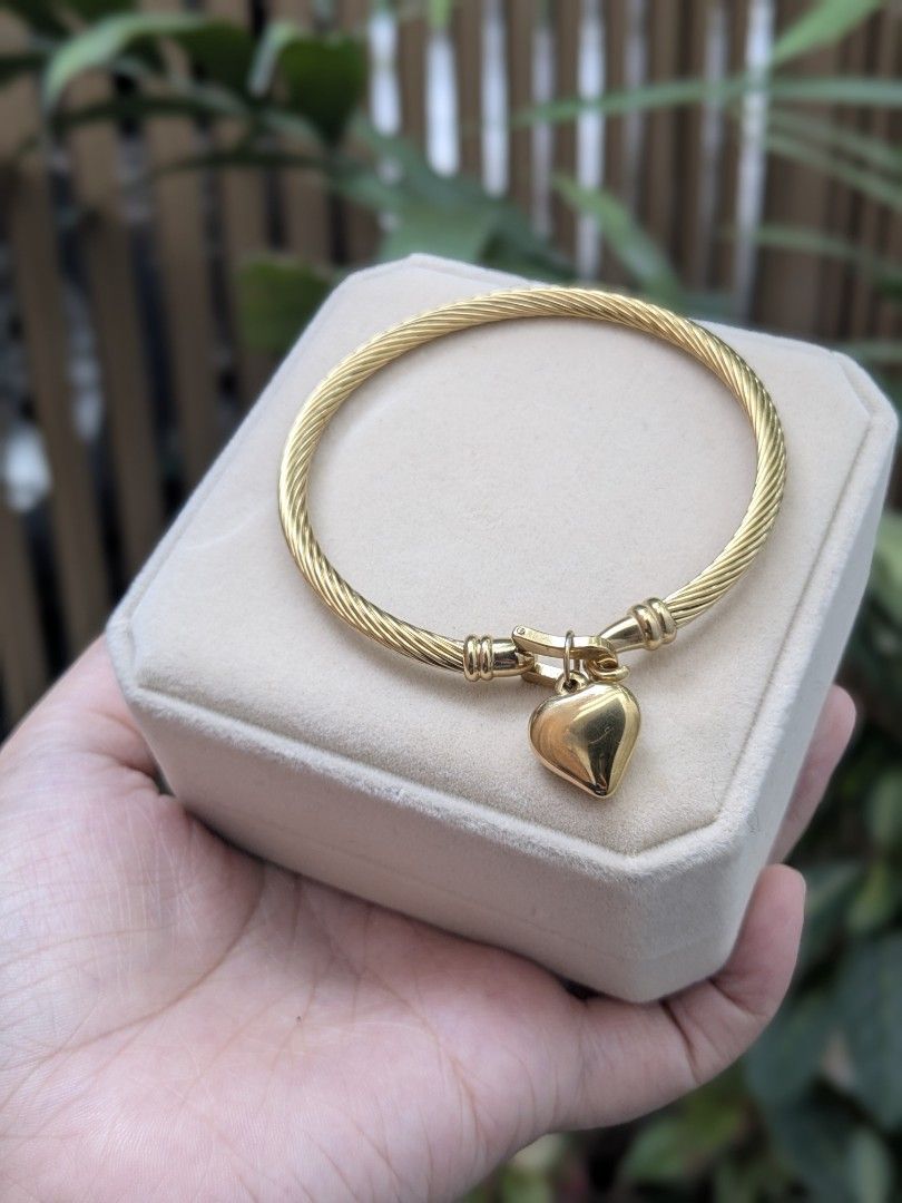 BKK Full Gold Tone Bangle Bracelet (Category: Bracelets) located in Quezon City. Submitted by nnncorner (Listing ID 1459023258, Image 2). Description: BKK Full Gold Tone Heart Bangle New with box Hypoallergenic Non tarnished Fits 15-20cm wrist only 690.