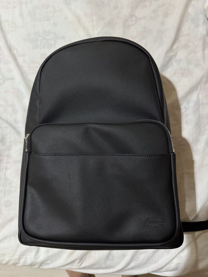 Lacoste Black Backpack with Padded Straps and Mesh Back (Category: Backpacks) located in Manila. Submitted by shoriljane (Listing ID 1458930398, Image 1). Description: - Lacoste Black backpack - Padded shoulder straps for comfort - Breathable mesh back panel - Adjustable straps for a custom fit - Ample interior space - Perfect for everyday use and travel.