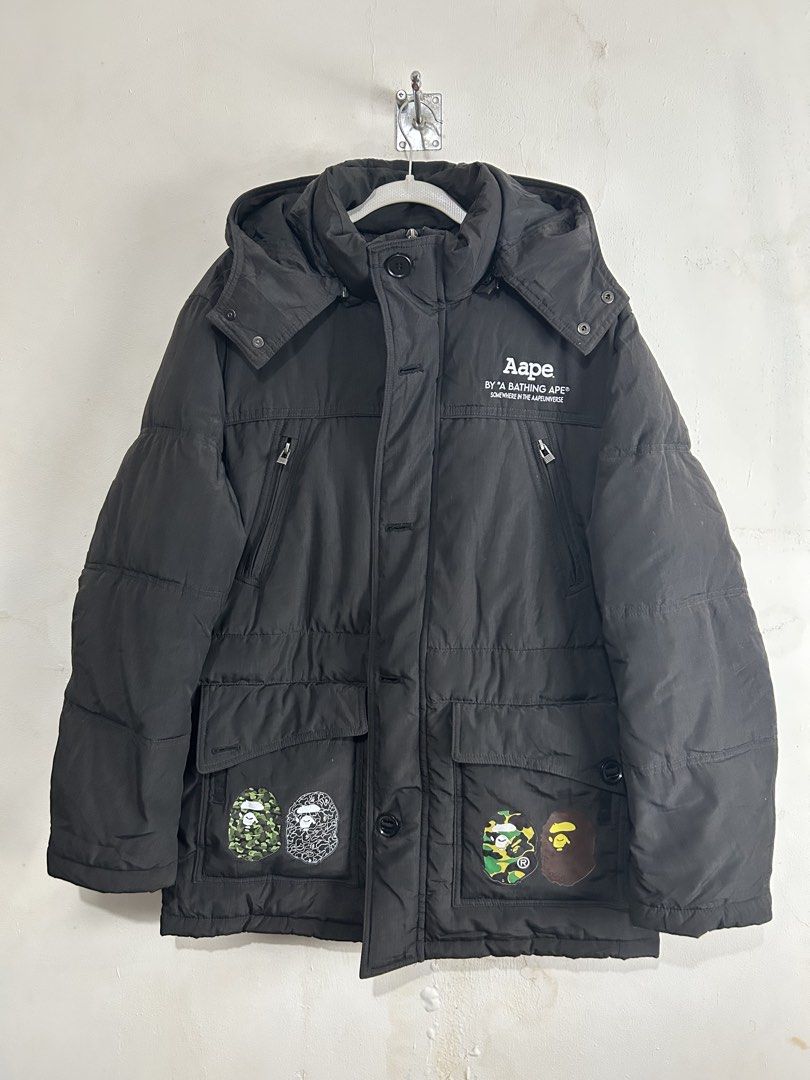 Black Hooded Puffer Jacket (Category: Coats, Jackets and Outerwear) located in Mandaluyong City. Submitted by 0lg2026 (Listing ID 1458992081, Image 1). Description: - Black puffer jacket - Features a hood - Quilted design for excellent warmth - Two buttoned side pockets - Ideal for colder weather - Easy to layer over any outfit.