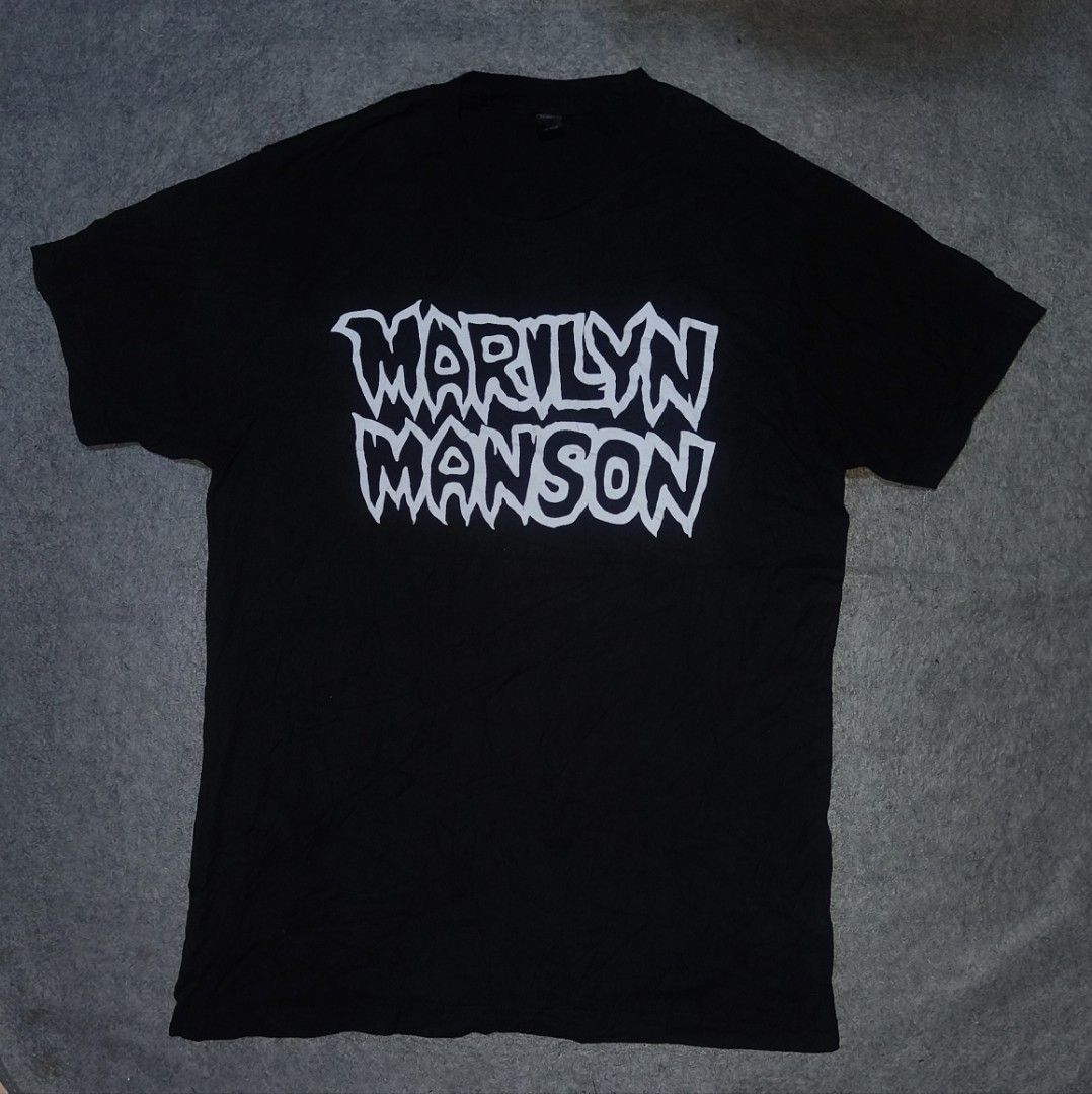 Black Marilyn Manson T-shirt Size M (Category: Tshirts & Polo Shirts ) located in Cagayan de Oro. Submitted by adamfitz (Listing ID 1458896969, Image 1). Description: - Black t-shirt with white Marilyn Manson graphic print - Made from 100% pre-shrunk cotton - Tag indicates size M - Comfortable and classic fit - Perfect for any Marilyn Manson fan 19.5x28 excellent no issues payment: Gcash, maribank & LBP courier: J&T color may vary due to lightnin