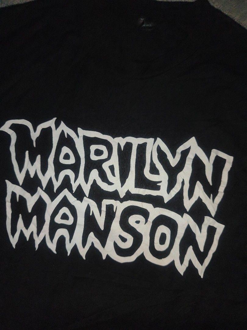 Black Marilyn Manson T-shirt Size M (Category: Tshirts & Polo Shirts ) located in Cagayan de Oro. Submitted by adamfitz (Listing ID 1458896969, Image 2). Description: - Black t-shirt with white Marilyn Manson graphic print - Made from 100% pre-shrunk cotton - Tag indicates size M - Comfortable and classic fit - Perfect for any Marilyn Manson fan 19.5x28 excellent no issues payment: Gcash, maribank & LBP courier: J&T color may vary due to lightnin