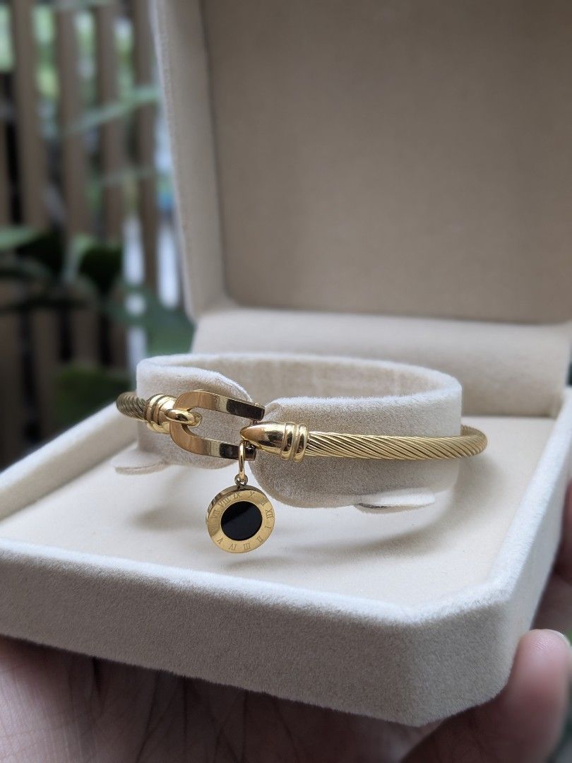Black Stone Full Gold Tone Bangle Bracelet (Category: Bracelets) located in Quezon City. Submitted by nnncorner (Listing ID 1459023859, Image 3). Description: BKK Black Stone Full Gold Tone Roman Numerals Bangle New with box Hypoallergenic Non tarnished Super pretty and nice in person Fits 15-20cm wrist only 890.