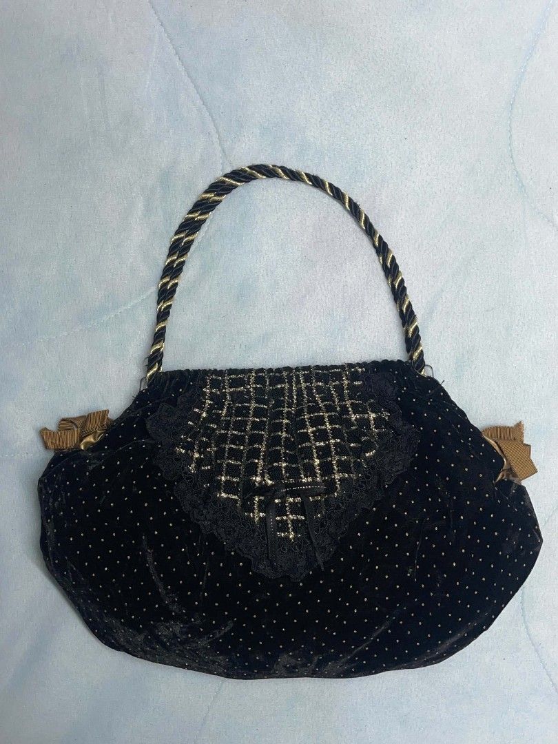 Black Velvet Beaded Drawstring Handbag with Gold Rope Handle (Category: Purses & Pouches) located in Binan City. Submitted by myks_thrift (Listing ID 1458966839, Image 1). Description: - Chic black velvet handbag with charming gold polka dots. - Elegant beaded lace detail on the front flap. - Stylish gold rope handle for comfortable carrying. - Secure drawstring closure with decorative gold ribbon ties. - Compact size, ideal as a clutch or evenin