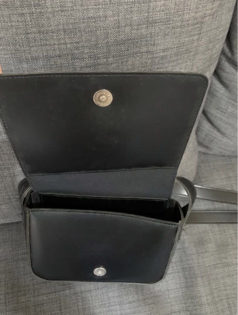 Black Woven Crossbody Bag (Category: Cross-body Bags) located in Quezon City. Submitted by fitsandfinds.hub (Listing ID 1459016537, Image 2). Description: Black Woven Crossbody Bag with Adjustable Strap.