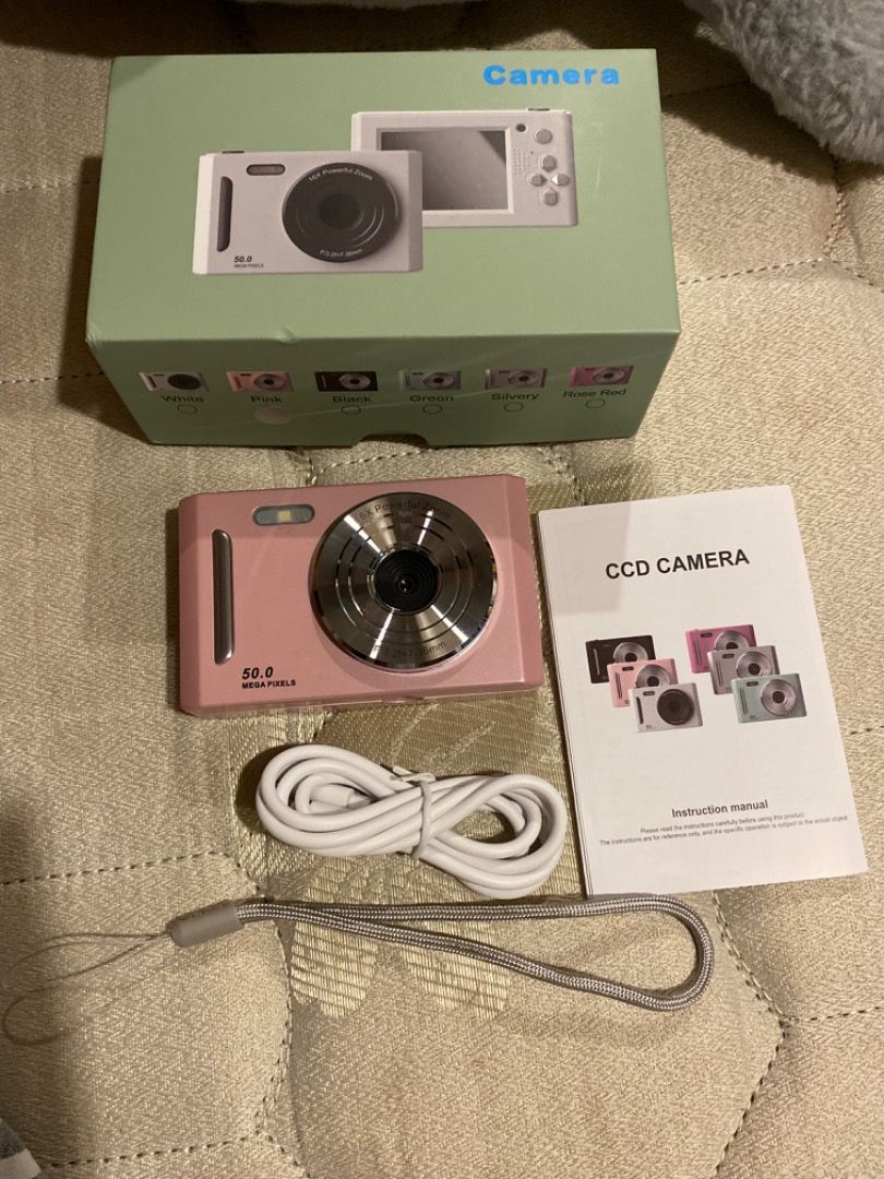 brand new no issue silver and pink digicam (Category: Cameras) located in Makati City. Submitted by jujubargainz (Listing ID 1446899586, Image 2). Description: ₱699 each pink and silver available no issue ! complete with charger and box and lanyard brand new no sample pics location taguig can do meet up.