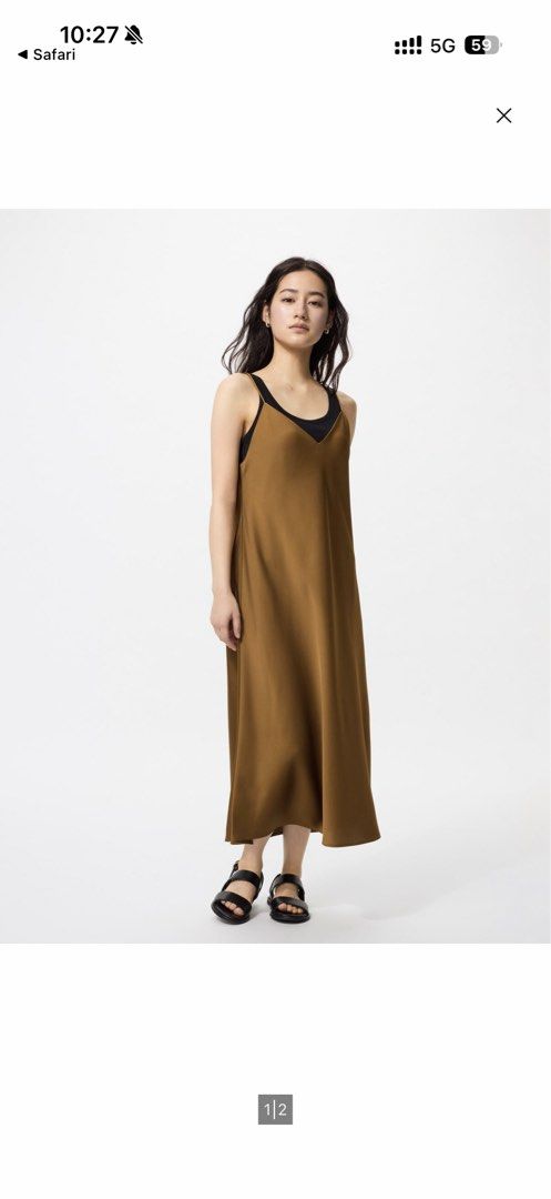 Brown Satin Slip Dress (Category: Dresses) located in Davao. Submitted by 44fdgr (Listing ID 1458905694, Image 1). Description: - Worn only once - Long brown satin slip dress - Features spaghetti straps - V-neckline - Perfect for dressing up or down - Can be worn alone or layered.