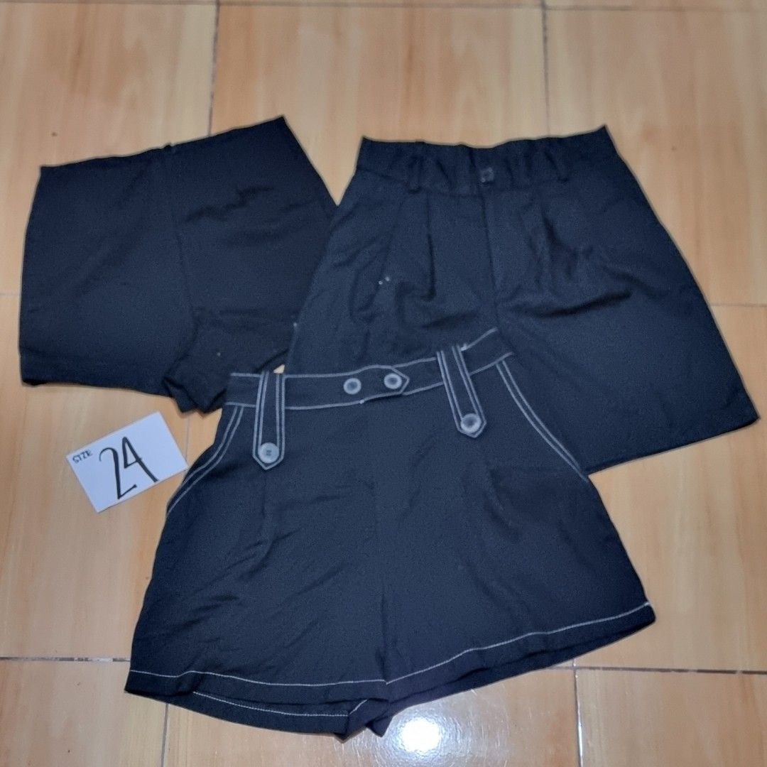 Bundle of 3 Black Shorts (Category: Other Bottoms) located in Diffun. Submitted by declutteredbyJill (Listing ID 1459087468, Image 1). Description: - Chic black shorts perfect for a statement outfit. - Unique white contrast stitching adds a stylish detail. - Features decorative buckle accents on the front. - Flattering high-waisted design. - Trendy wide-leg or flare silhouette. - Size: 24.