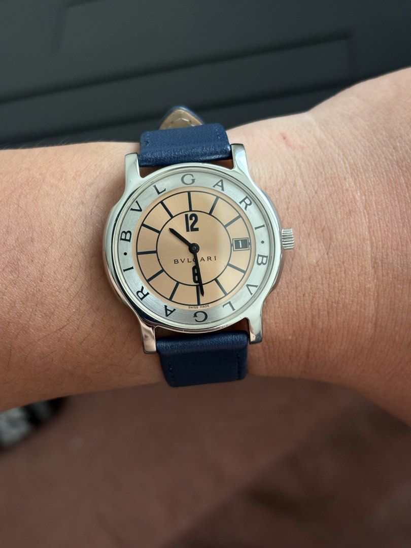 Bvlgari Solotempo ST 35 S Watch (Category: Women's Watches) located in Manila. Submitted by parkabduljonathan (Listing ID 1458906344, Image 3). Description: - Authentic Bvlgari Solotempo Watch - Stainless Steel Case - Unique Salmon Dial - Date Window at 3 o'clock - Comfortable Navy Blue Leather Strap - Model: ST 35 S - Swiss Made - Serial Number: D75078.
