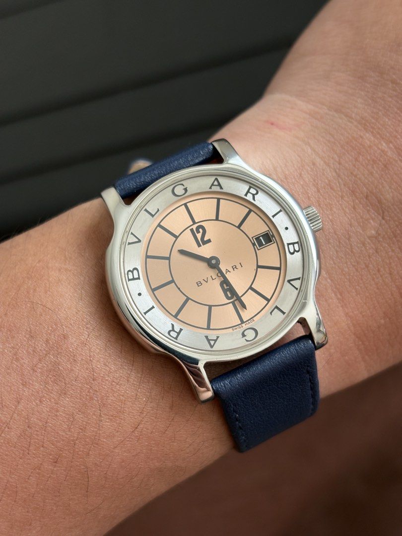 Bvlgari Solotempo ST 35 S Watch (Category: Women's Watches) located in Manila. Submitted by parkabduljonathan (Listing ID 1458906344, Image 1). Description: - Authentic Bvlgari Solotempo Watch - Stainless Steel Case - Unique Salmon Dial - Date Window at 3 o'clock - Comfortable Navy Blue Leather Strap - Model: ST 35 S - Swiss Made - Serial Number: D75078.