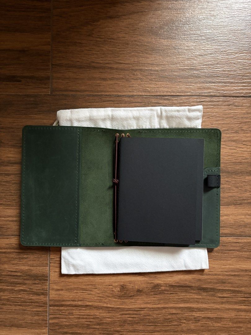 Cada Dia A6 Bifold (Category: Luxury Bags & Wallets) located in Rizal. Submitted by g__preloved (Listing ID 1458889642, Image 3). Description: crazy horse leather in pine opened but never used, comes with the two plain cada dia notebooks, drawstring pouch, box, and extra outer cord (red) ❌ pocket insert sold rfs: this was a gift. i already have a journal..
